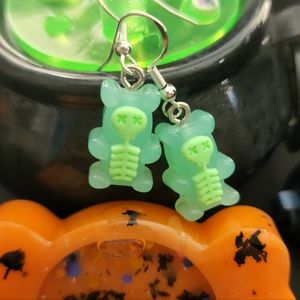 Green gummy bear skeleton earrings